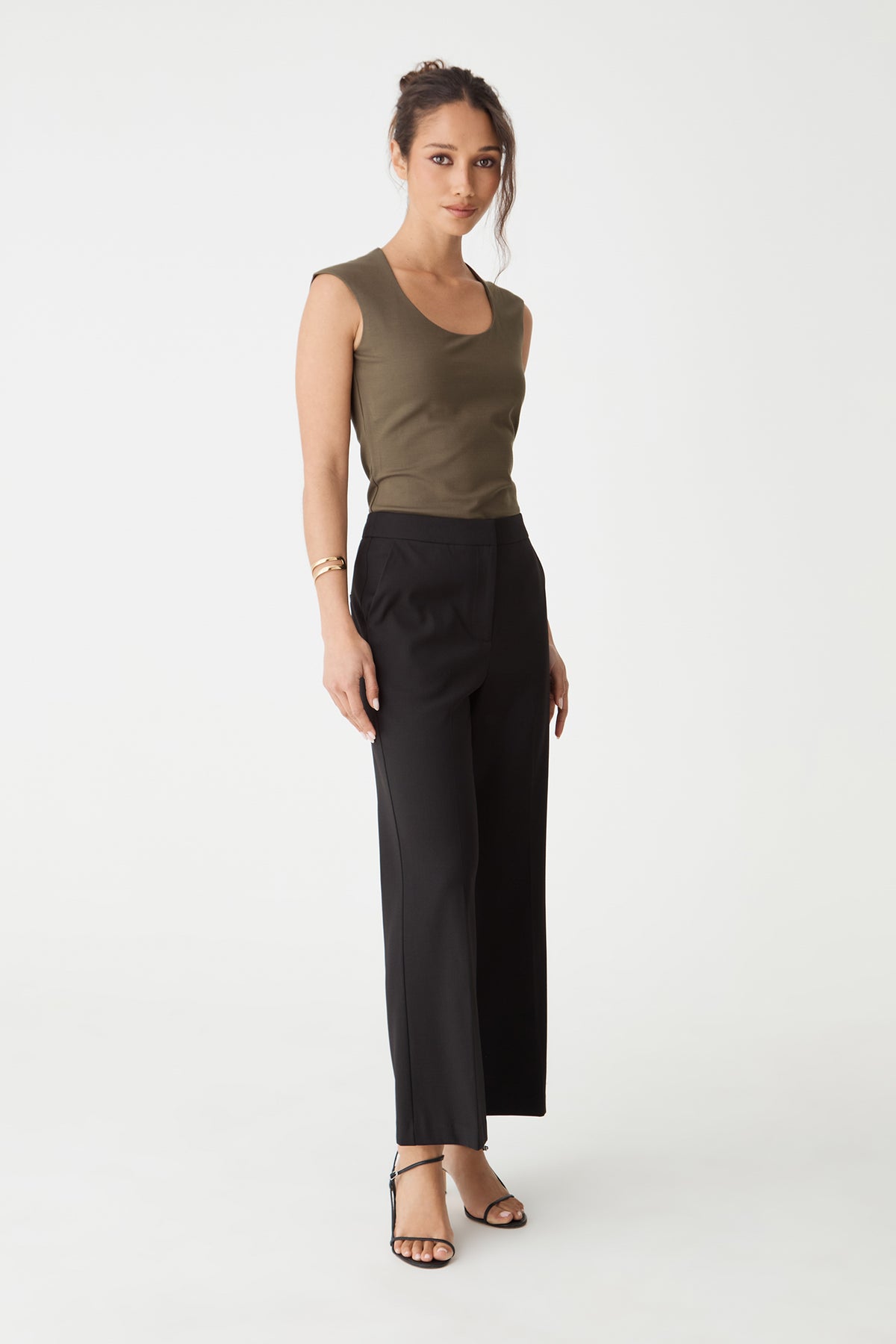 Side view of the mocha brown top showing fitted silhouette