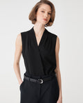 Alivia 2 V-Neck Top in black, front view worn sleeveless with black belted trousers