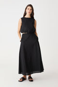Kenya Linen Skirt in black, front view, worn with matching sleeveless Kenya Ruched Linen Top