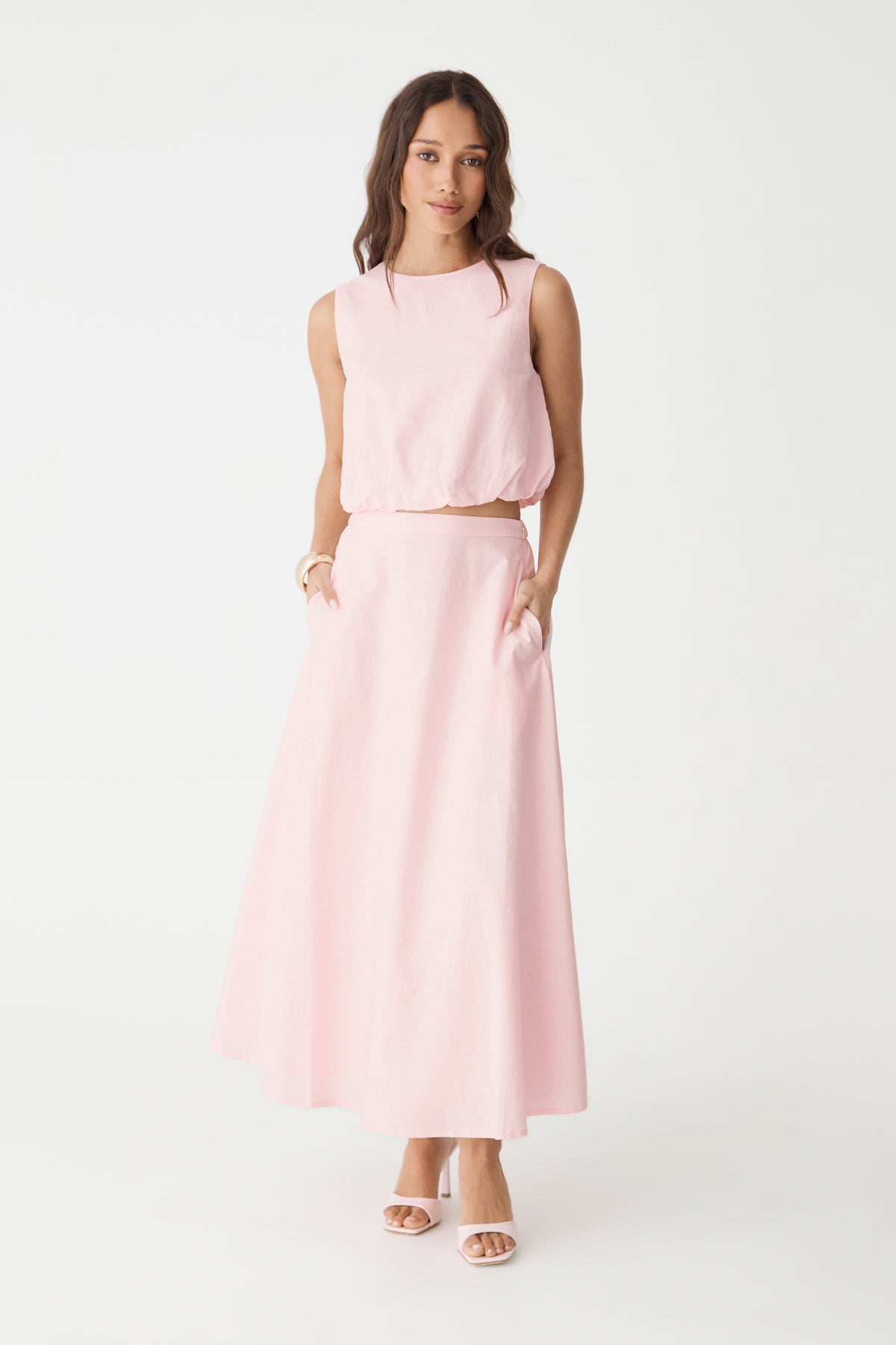 Kenya Linen Skirt in Fairy Floss pink, front view, worn with matching sleeveless top