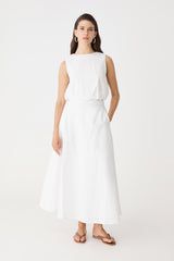 Kenya Linen Skirt in ivory, front view worn with matching sleeveless ivory top and tan sandals