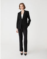 Merid Single Breasted Blazer in black, front view worn open with matching black tailored pants