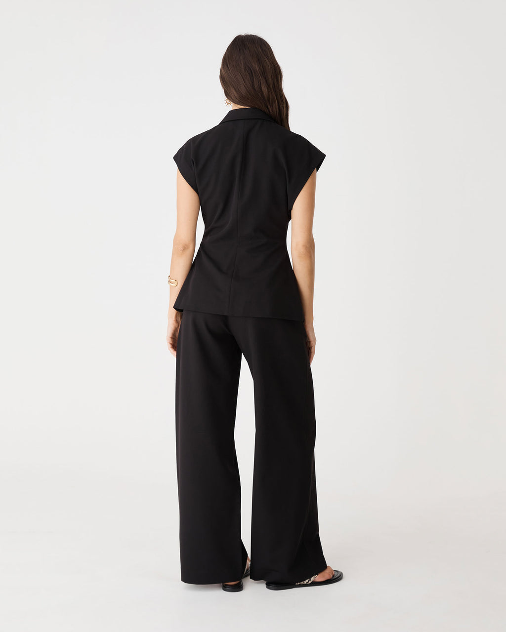 Back view showing faux welt pockets on the black Milton Wide Leg Pants