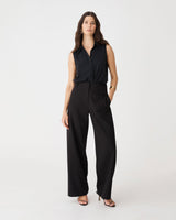 Milton Wide Leg Pants in black, front view worn with a black sleeveless shirt