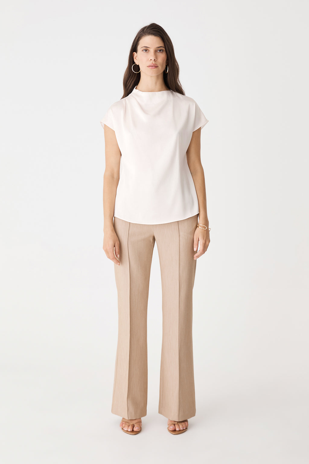 Zafina Pleated Draped Top in pearl, front view with cap sleeves, worn with beige trousers