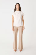 Zafina Pleated Draped Top in pearl, front view with cap sleeves, worn with beige trousers