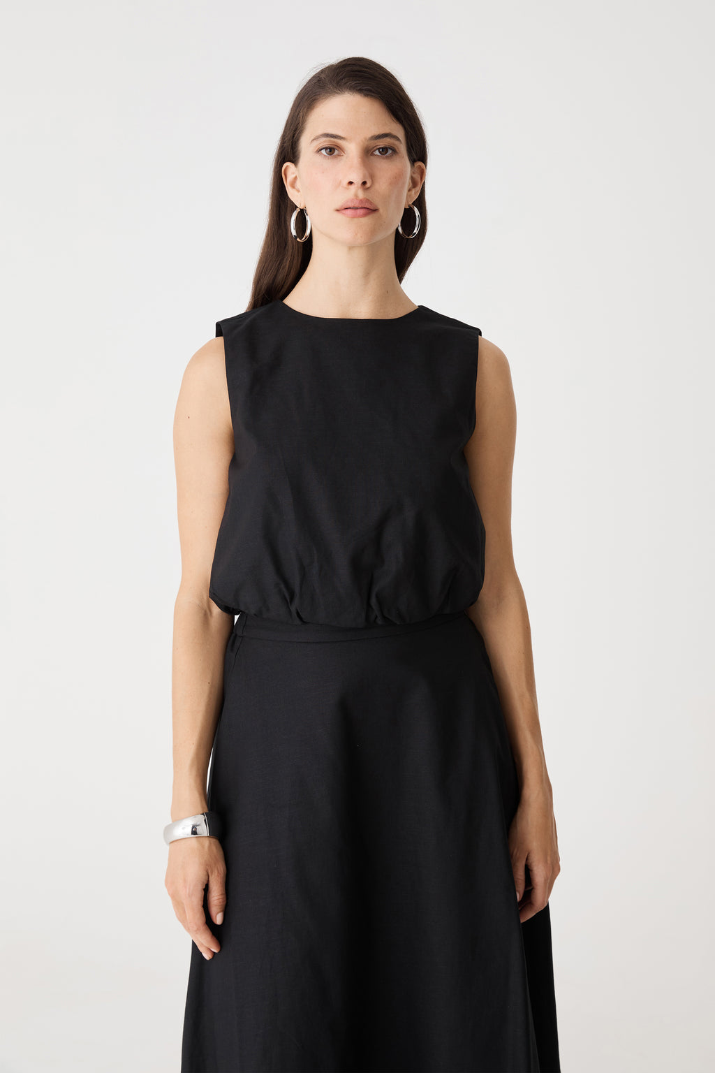 Close-up front view of the black Kenya 2 Ruched Linen Top, showing round neckline and sleeveless cut