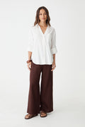 Jazie Tencel Linen Tab Shirt in ivory, front view with rolled tab sleeves and brown wide-leg pants