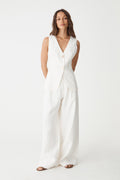 Ami V-Neck Linen Vest in white, front view worn with matching white wide leg linen pants