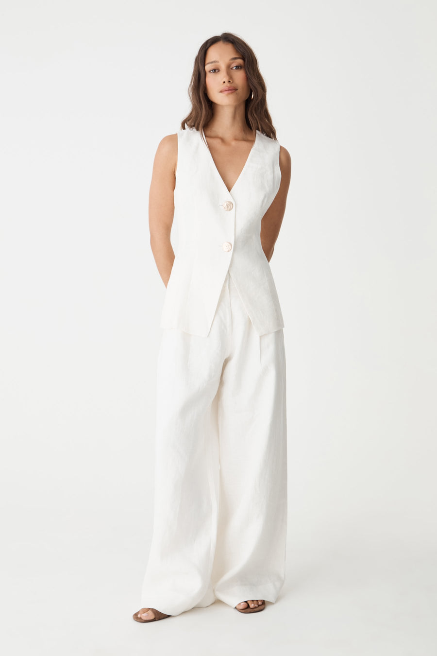Ami V-Neck Linen Vest in white, front view worn with matching white wide leg linen pants