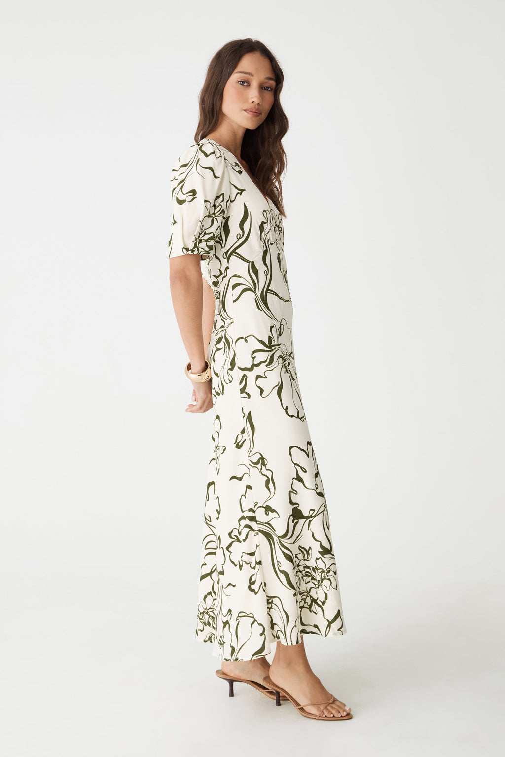 Side view of the cream and olive floral midi dress, full length
