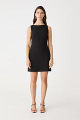 Lydia Sleeveless Mini Dress in black, front view worn with strappy heeled sandals