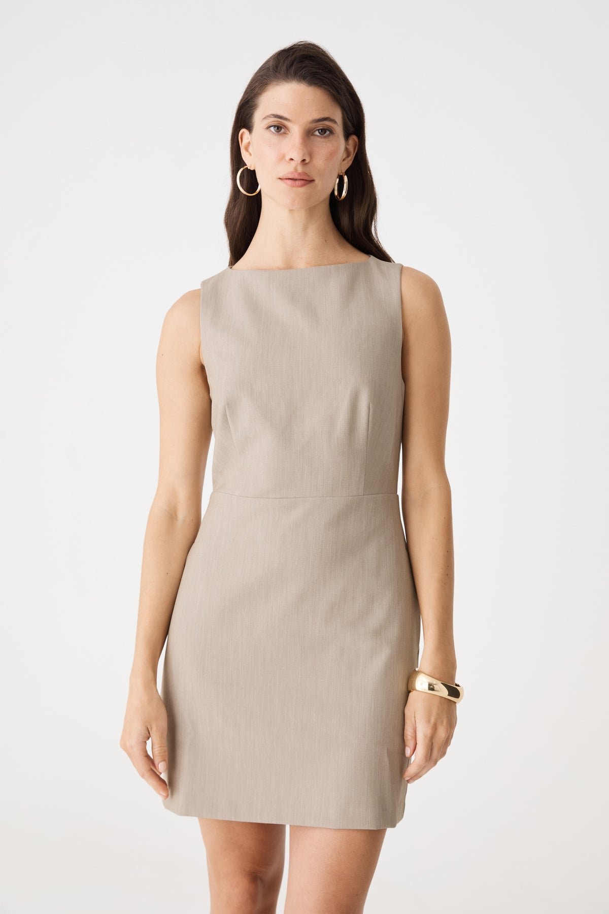 Front view close-up of the Driftwood mini dress showing high boat neckline and waist seam