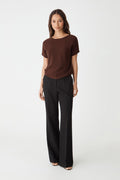 Brandy Relaxed Cotton Knit Top in Fudge brown, front view worn with black wide-leg trousers