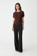 Brandy Relaxed Cotton Knit Top in Fudge brown, front view worn with black wide-leg trousers