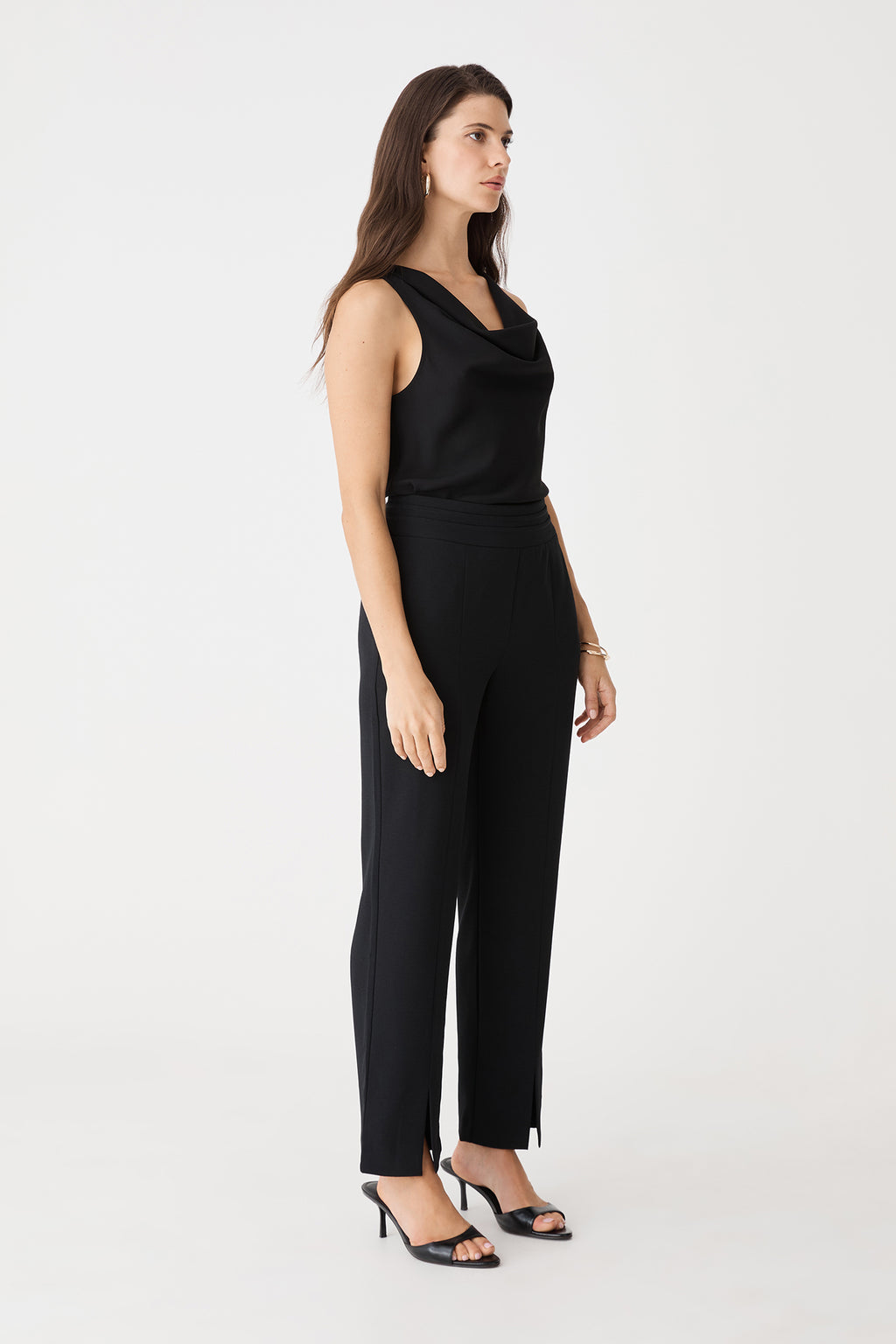 Side view of the black Tilda Split Hem Pants with straight-leg silhouette