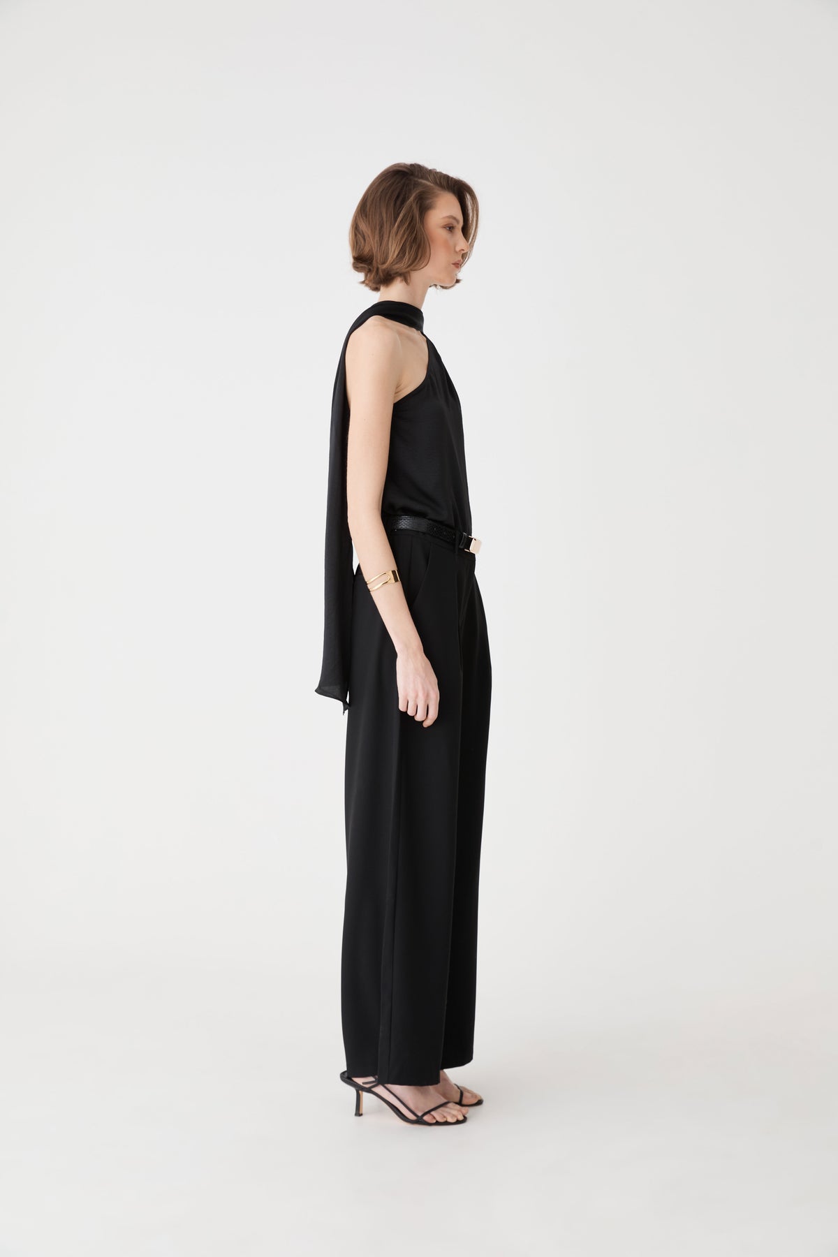 Daphne Pleated Crepe Pants in black — side view