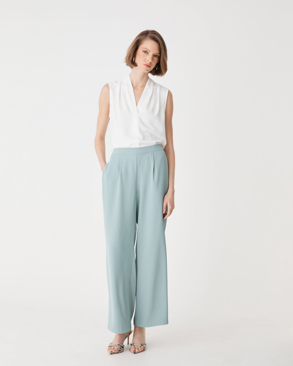 Maggie Elastic Waist Pants in Eucalyptus, front view worn with a white sleeveless top