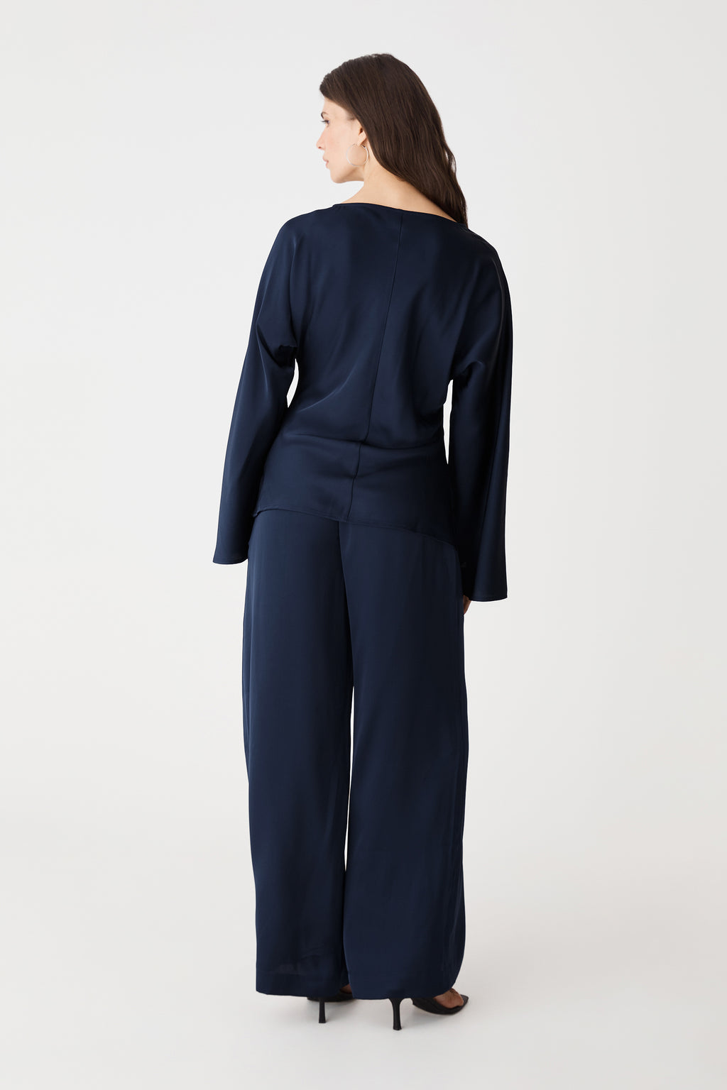 Back view of the navy satin wide-leg pants with matching top