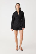 Katrina Wrap Shirt in black, front view worn with black shorts
