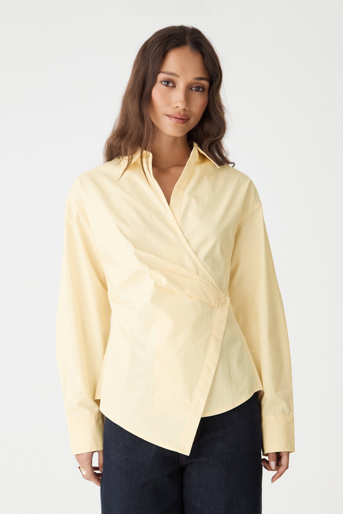 Front view close-up of the Katrina Wrap Shirt in Limoncello, showing asymmetrical wrap front and pointed collar