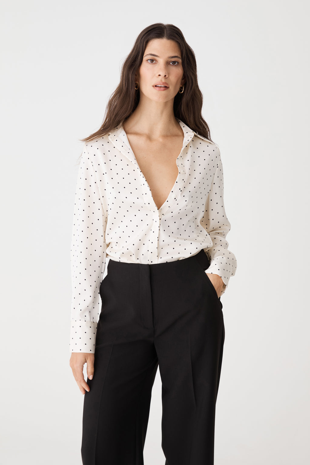 Front view of the Courtney Satin Spot Shirt in Ivory & Black Dot, open V neckline and long sleeves