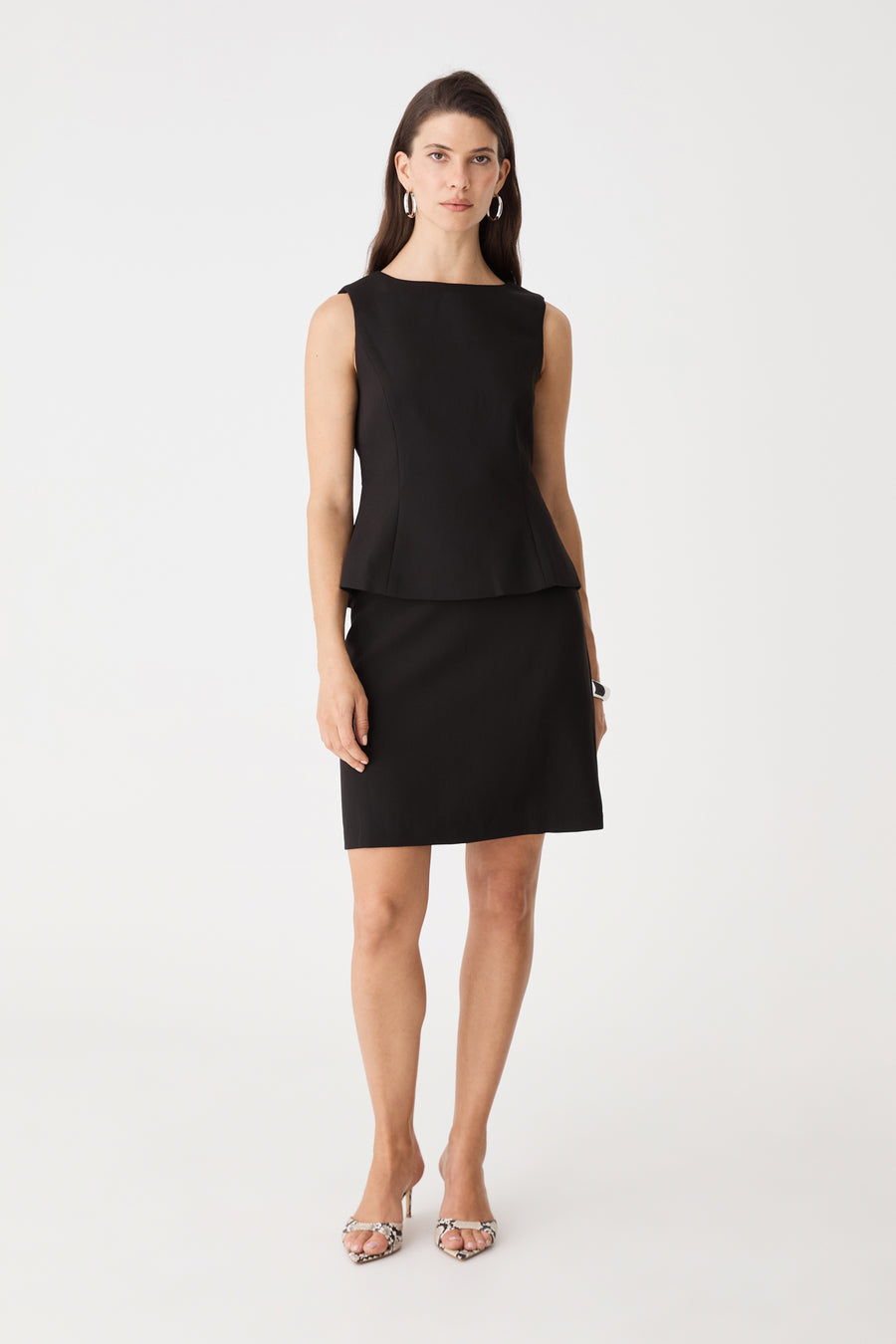 Melanie 2 Tailored Top in black, front view worn with matching black skirt