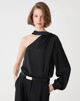 Lumi Croc Effect Belt in black with gold-tone buckle, worn at the waist with a black one-shoulder top and trousers
